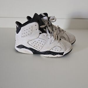 Jordan White and Black High-Top Sneakers with Iconic Design